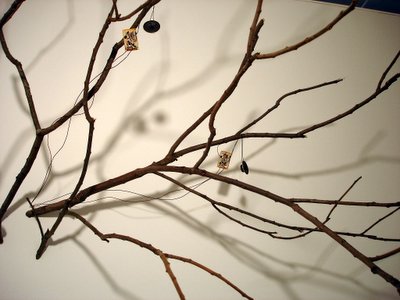 Photo of Jessica Rylan's electronic birds roosting in the branches